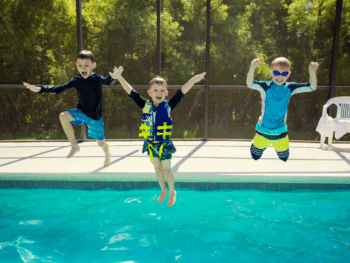 kids jumping into neighborhood pool richmond va